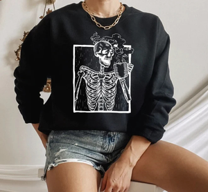 black long sleeve sweatshirt with a skeleton drinking coffee from a mug on white print, With Love Louise, shop small