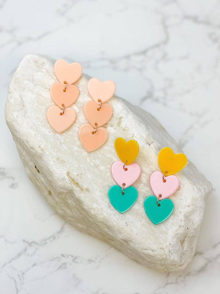 Prep Obsessed Wholesale - Acrylic Triple Heart Dangle Earrings: Blush