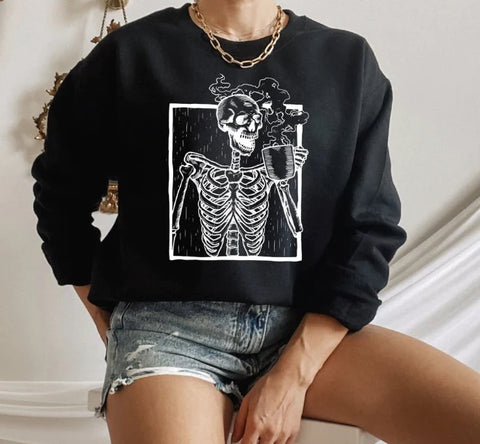 black sweatshirt featuring a skeleton drinking coffee in white print.  Made in Tennessee, With Love Louise